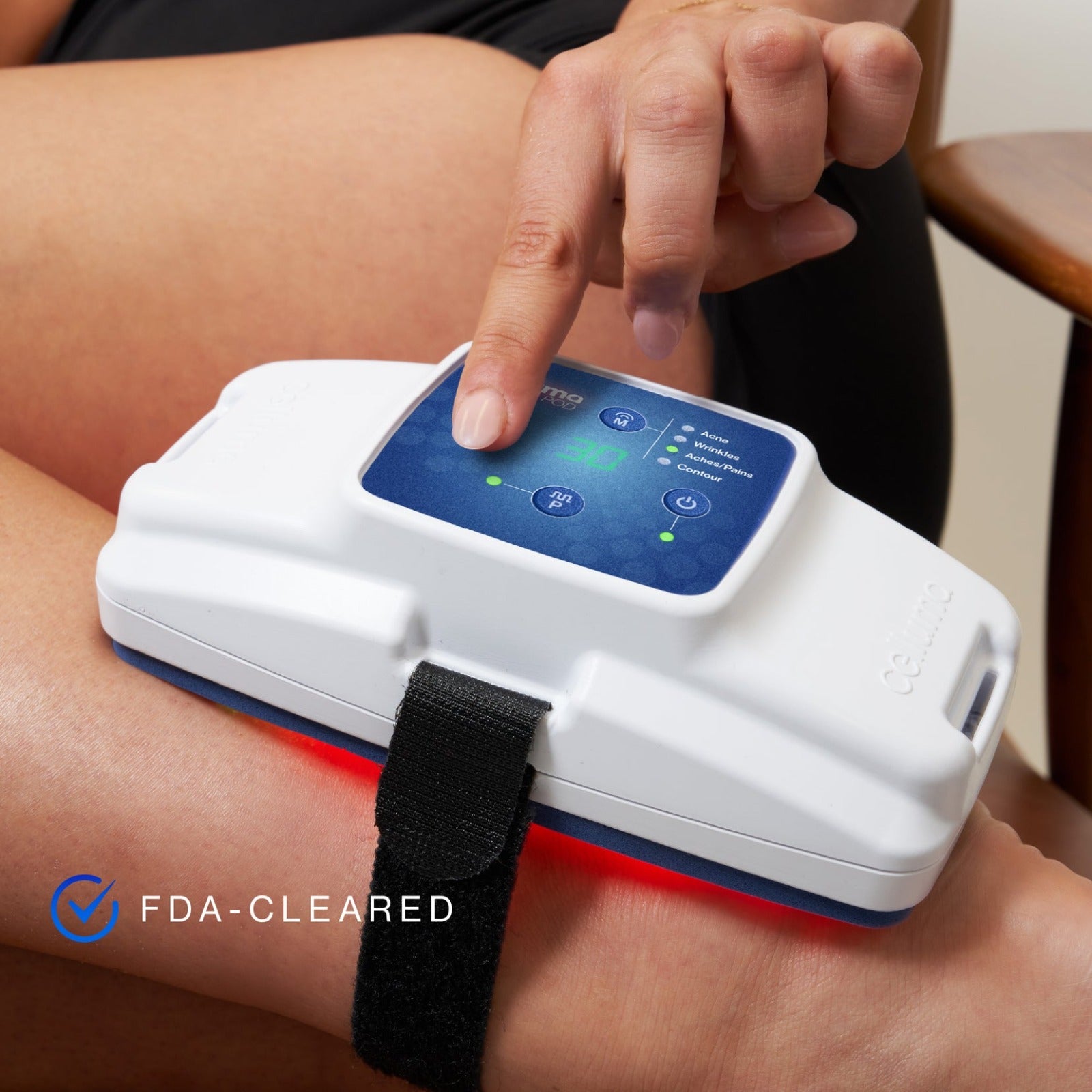 Digital device on a wrist with a finger pressing a button, labeled 'FDA-Cleared'.
